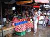 7-28 033 The 'Dragon' buying dragon fruit Hue Market.jpg